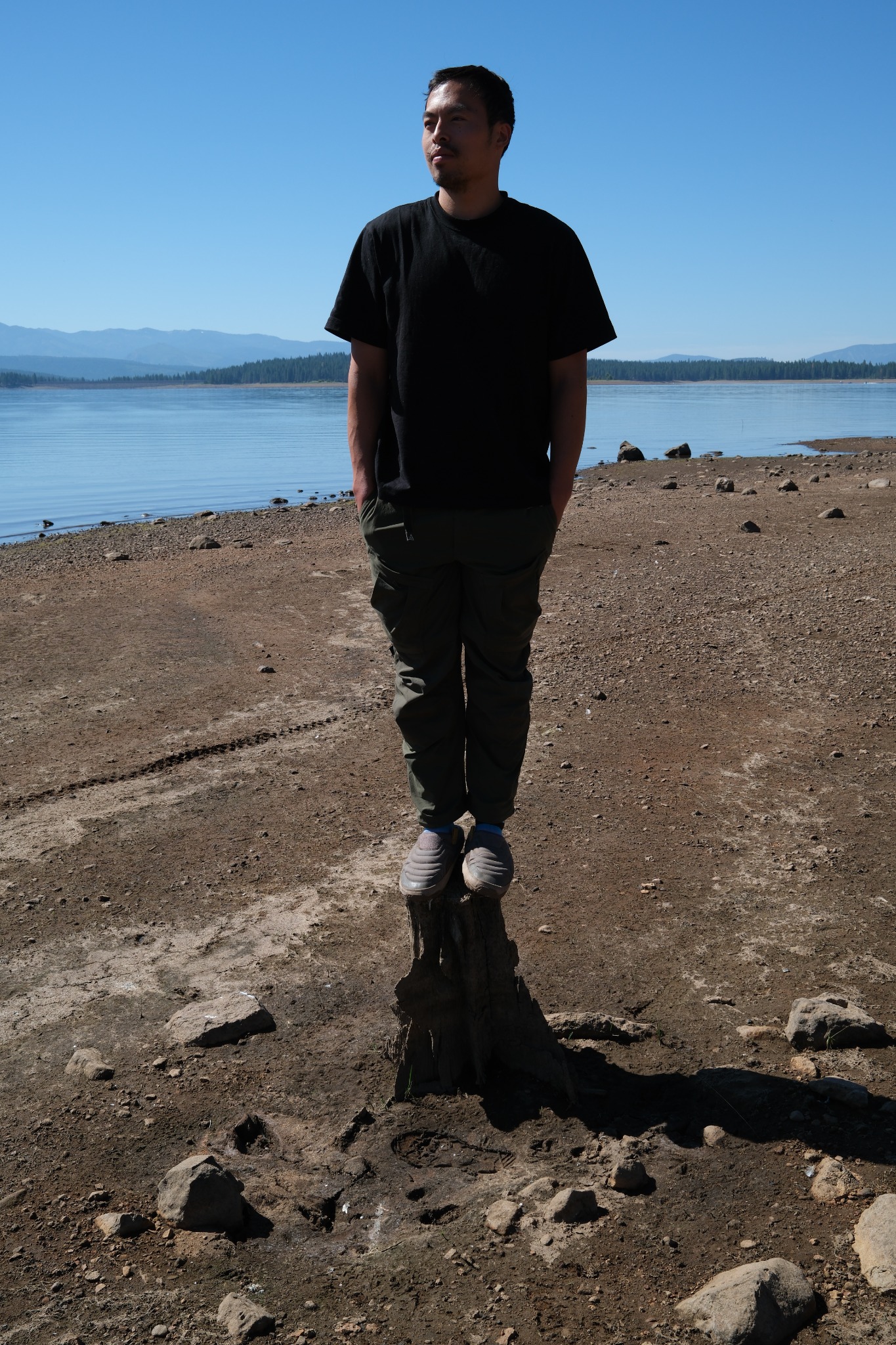 bramz artist portrait by a lake