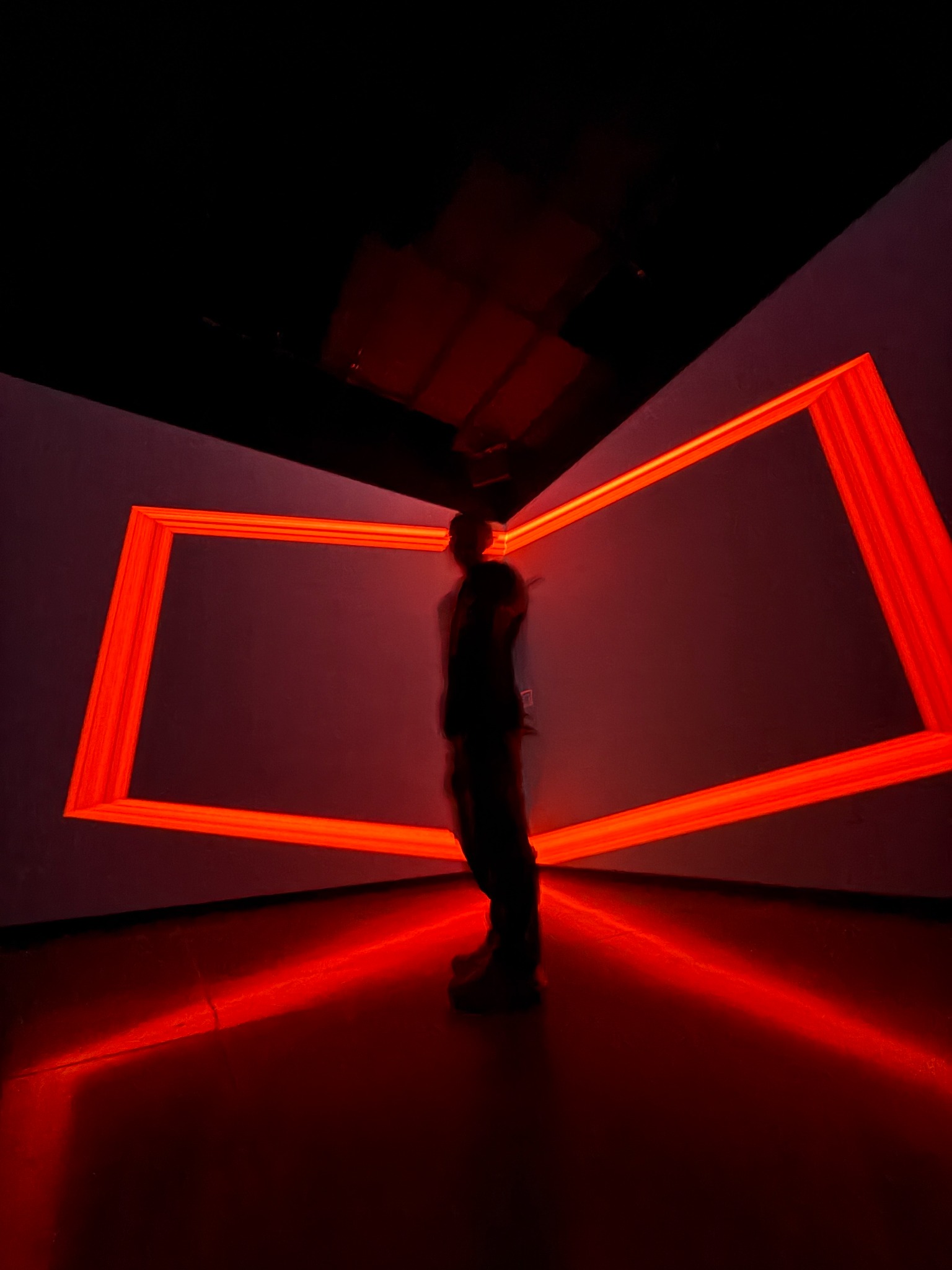 bramz artist photo in red-lit room
